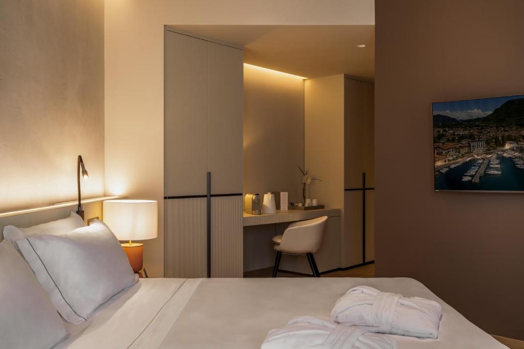 Postel nebo postele na pokoji v ubytování Bellerive Lifestyle Hotel