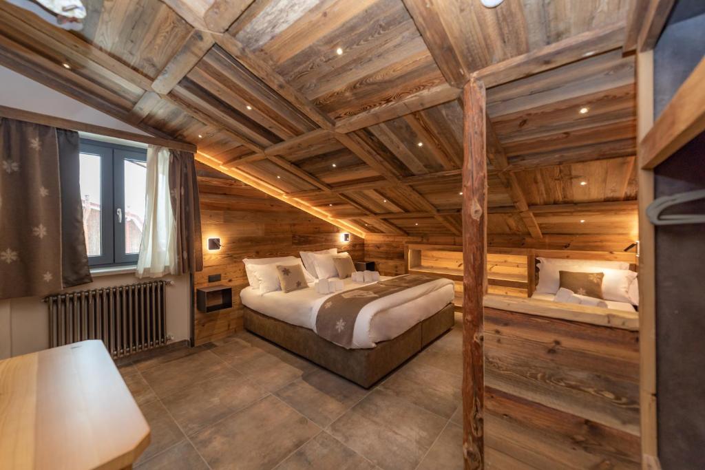 Postel nebo postele na pokoji v ubytování Avalanche - Alpine Boutique Hotel
