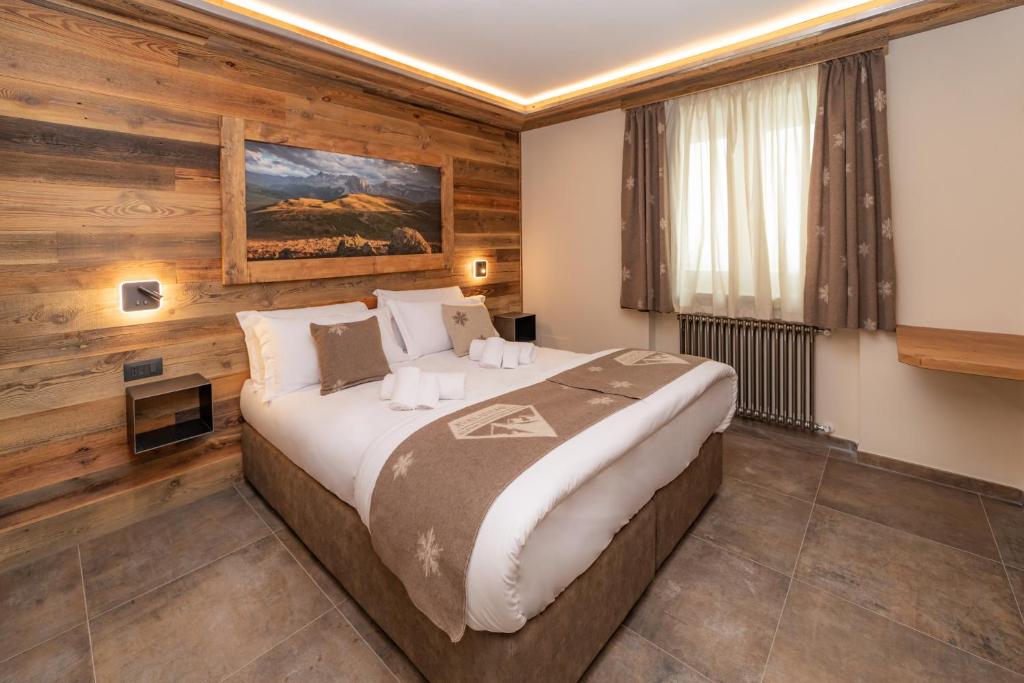 Postel nebo postele na pokoji v ubytování Avalanche - Alpine Boutique Hotel