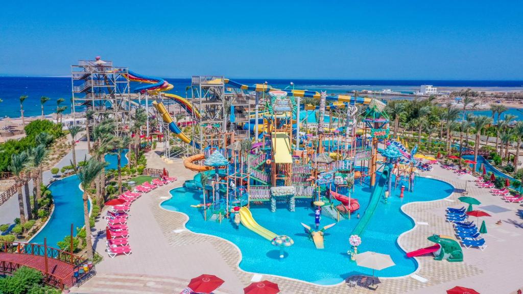 an aerial view of a water park at the beach at Calimera Blend Paradise in Hurghada