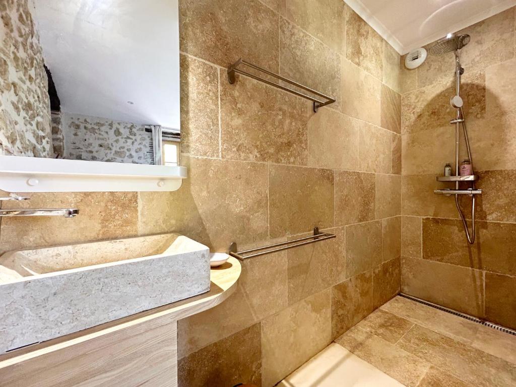 Koupelna v ubytování Barbarens Maison d'hotes