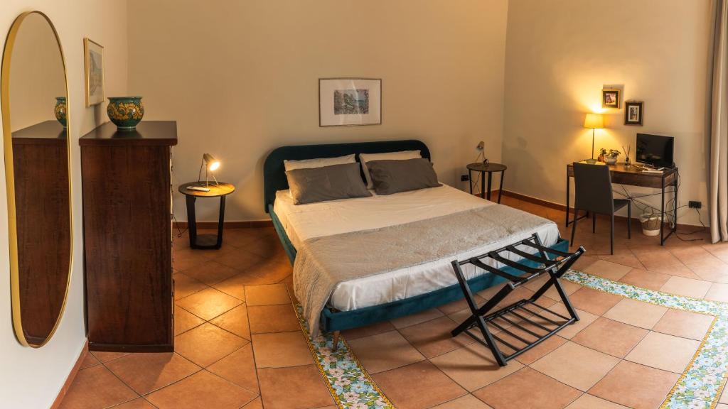 Ένα ή περισσότερα κρεβάτια σε δωμάτιο στο Hippocratica