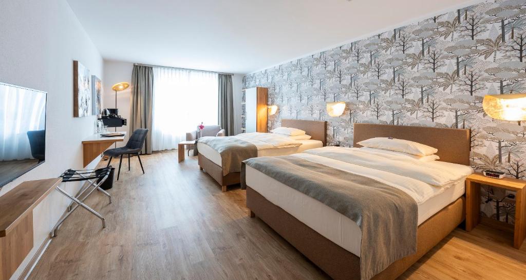 Postel nebo postele na pokoji v ubytování Best Western Plus iO Hotel