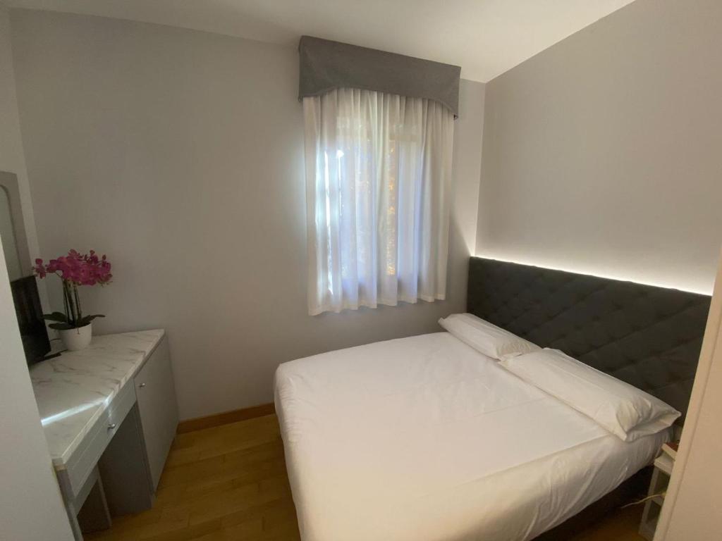 Postel nebo postele na pokoji v ubytování Park Hotel Villa Giustinian