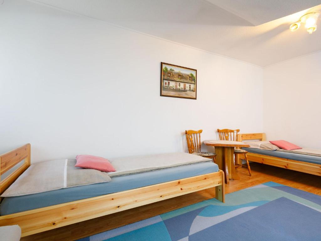 Posteľ alebo postele v izbe v ubytovaní Apartment Gerania by Interhome