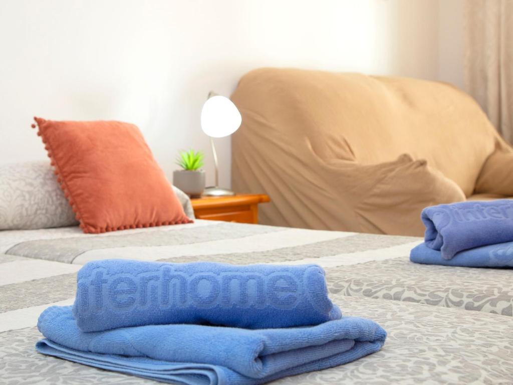 A bed or beds in a room at Studio Apolo VI-6 by Interhome