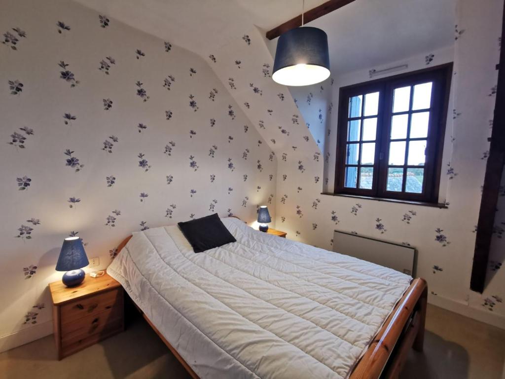 Posteľ alebo postele v izbe v ubytovaní Holiday Home La maison bleue by Interhome