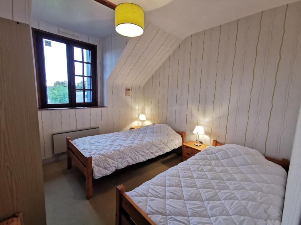 Posteľ alebo postele v izbe v ubytovaní Holiday Home La maison bleue by Interhome