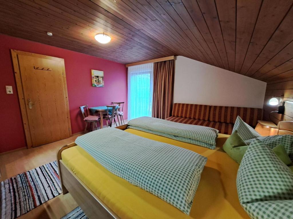 Postel nebo postele na pokoji v ubytování Apartment Schragl by Interhome