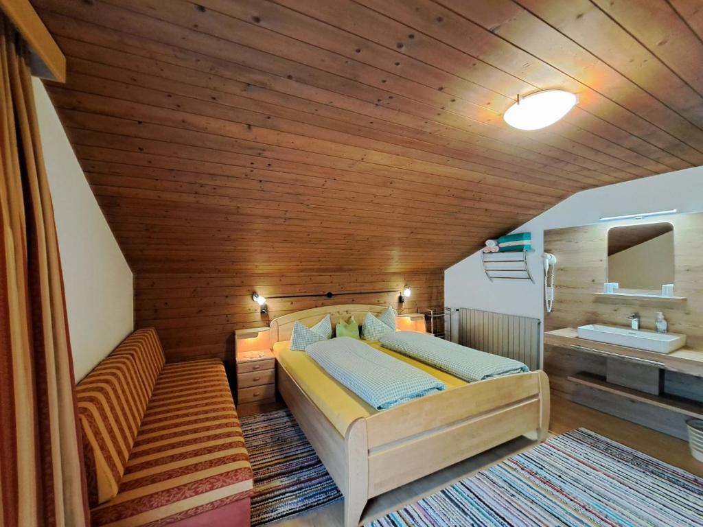 Postel nebo postele na pokoji v ubytování Apartment Schragl by Interhome