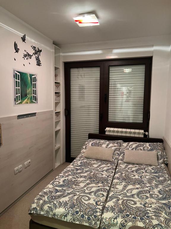 Posteľ alebo postele v izbe v ubytovaní Apartment Sweet Dreams-close to ZOO,Dinamo stadium and the city center