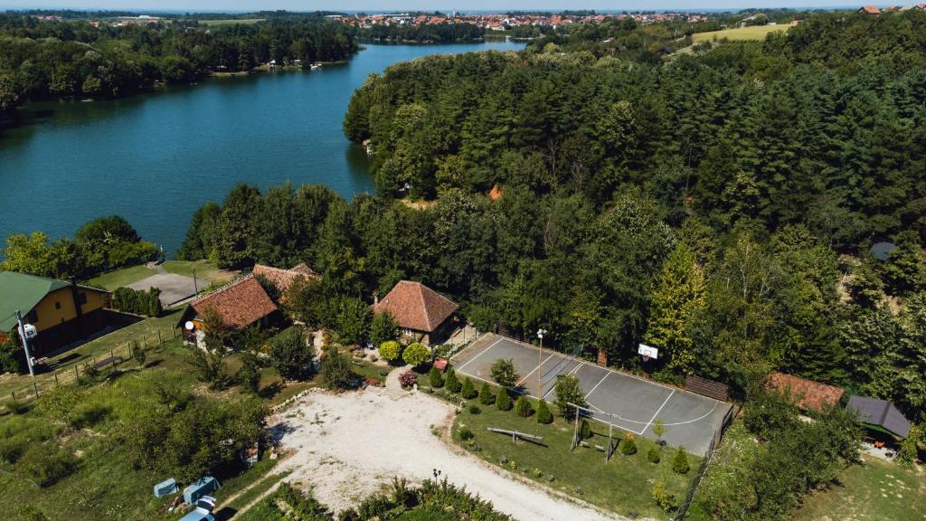 an aerial view of a house next to a river at Magaze de Luxe in Gradačac