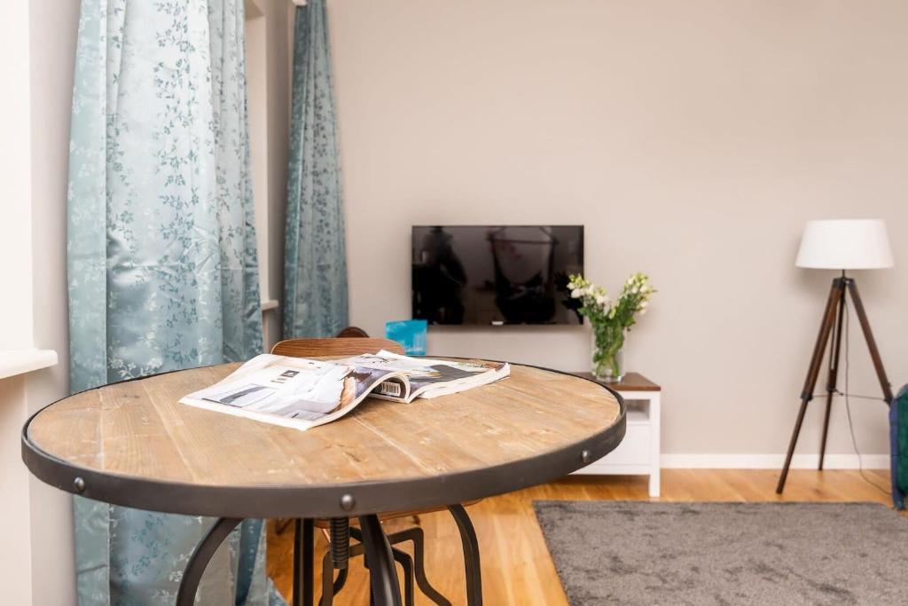 Posedenie v ubytovaní Plac Zamkowy - Aura Apartment by Noclegi Renters