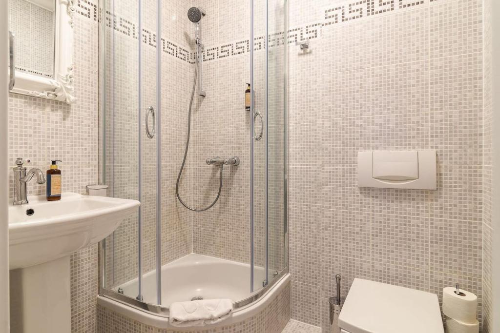 Kúpeľňa v ubytovaní Plac Zamkowy - Aura Apartment by Noclegi Renters