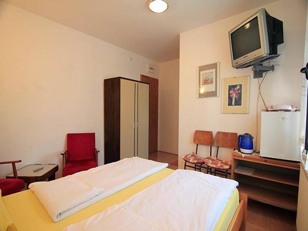 TV a/nebo společenská místnost v ubytování Guest House 3M