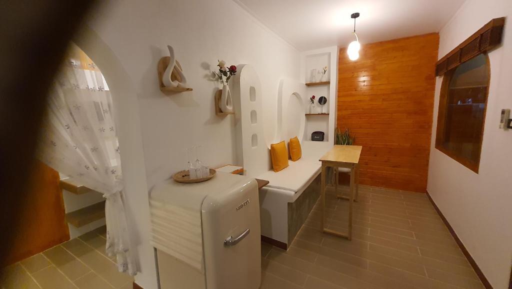 Kuchyň nebo kuchyňský kout v ubytování บ้านมัจฉา