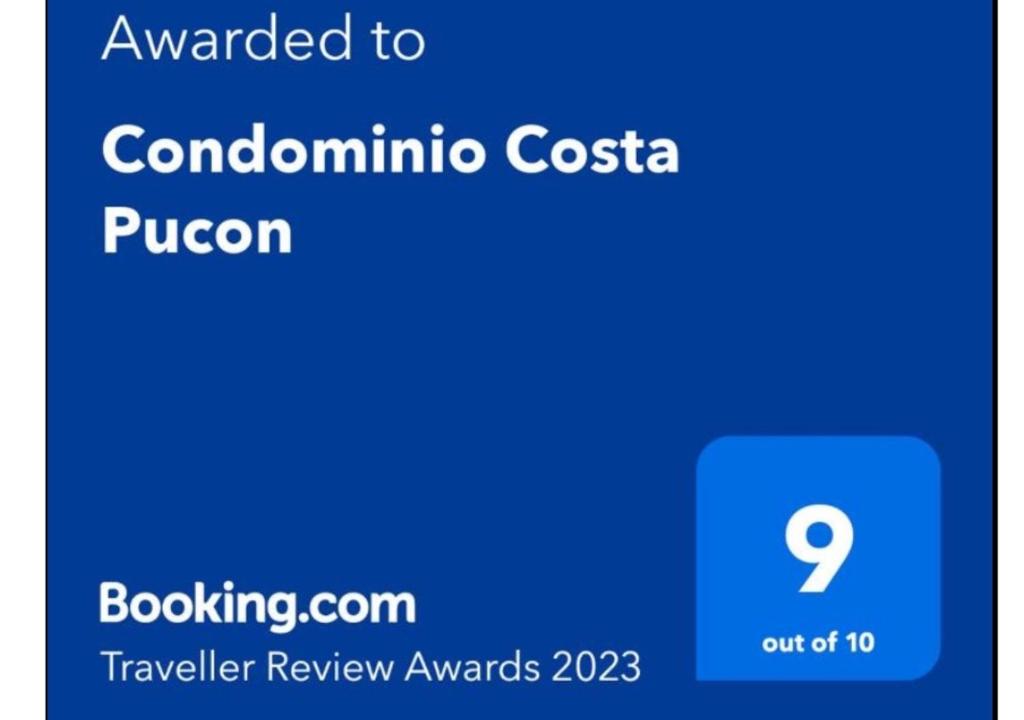 a screenshot of a cell phone with the text awarded to coronomino costa at Condominio Costa Pucon in Pucón