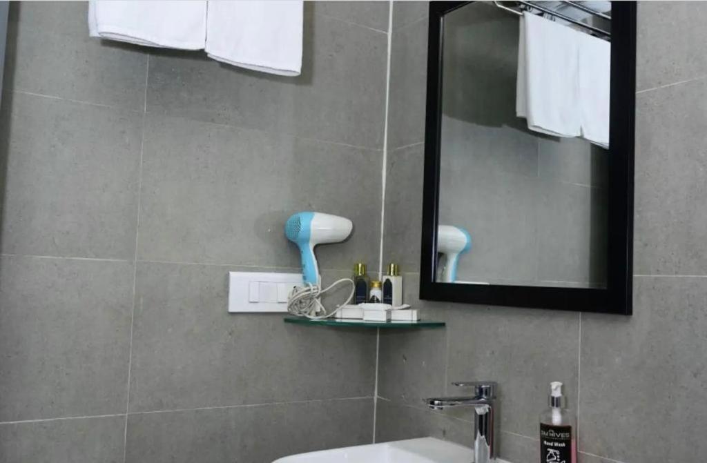Koupelna v ubytování SM Hives Business Hotel