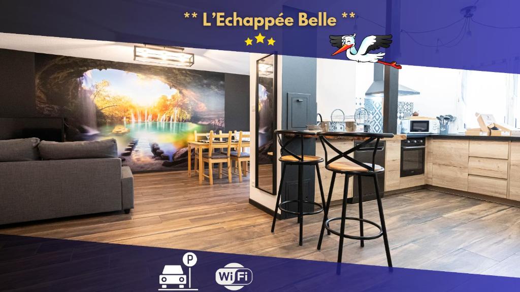 a living room with a kitchen and a bar at °*°* L'échappée Belle *°*° in Schiltigheim