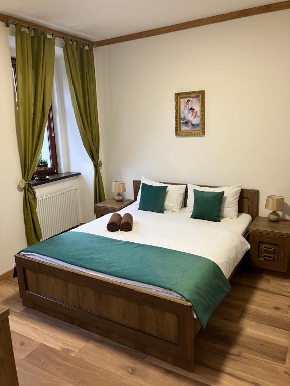 Postel nebo postele na pokoji v ubytování Egrensis Apartments