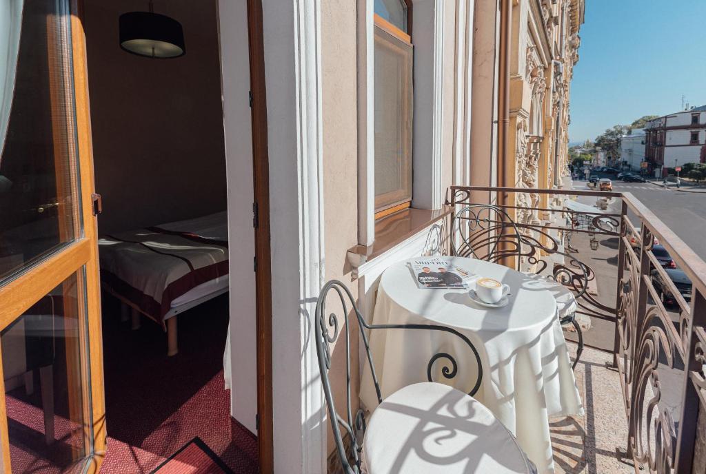 Balkón nebo terasa v ubytování Boutique Hotel Palais Royal