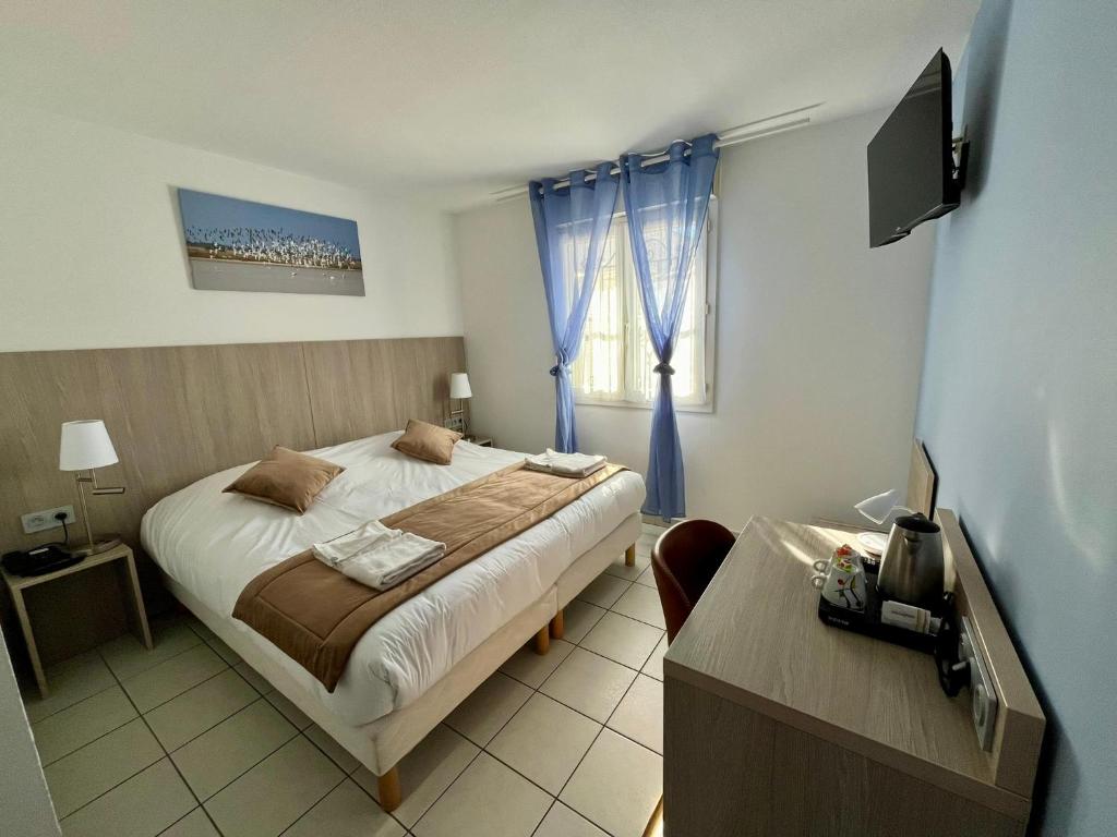 Hôtel Les Arcades - 17