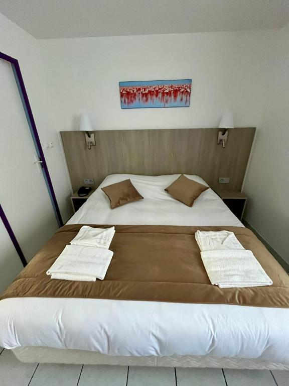 Hôtel Les Arcades - 16