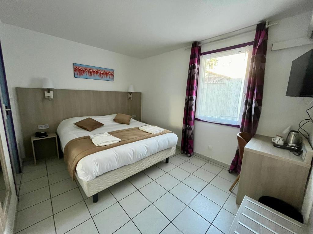 Hôtel Les Arcades - 15