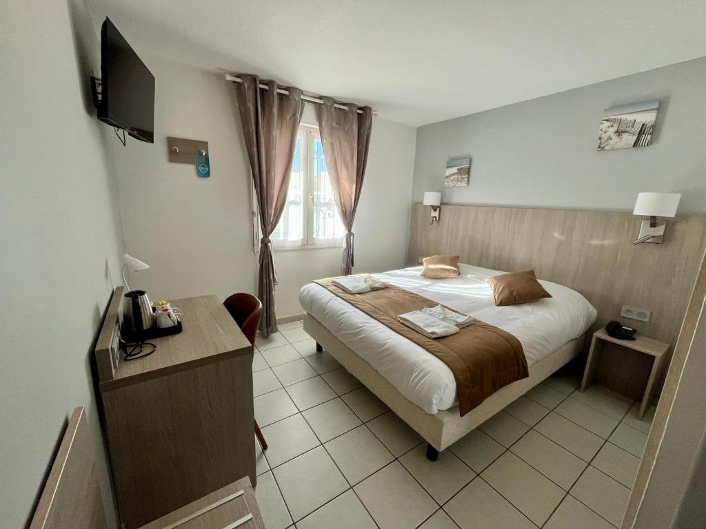 Hôtel Les Arcades - 14