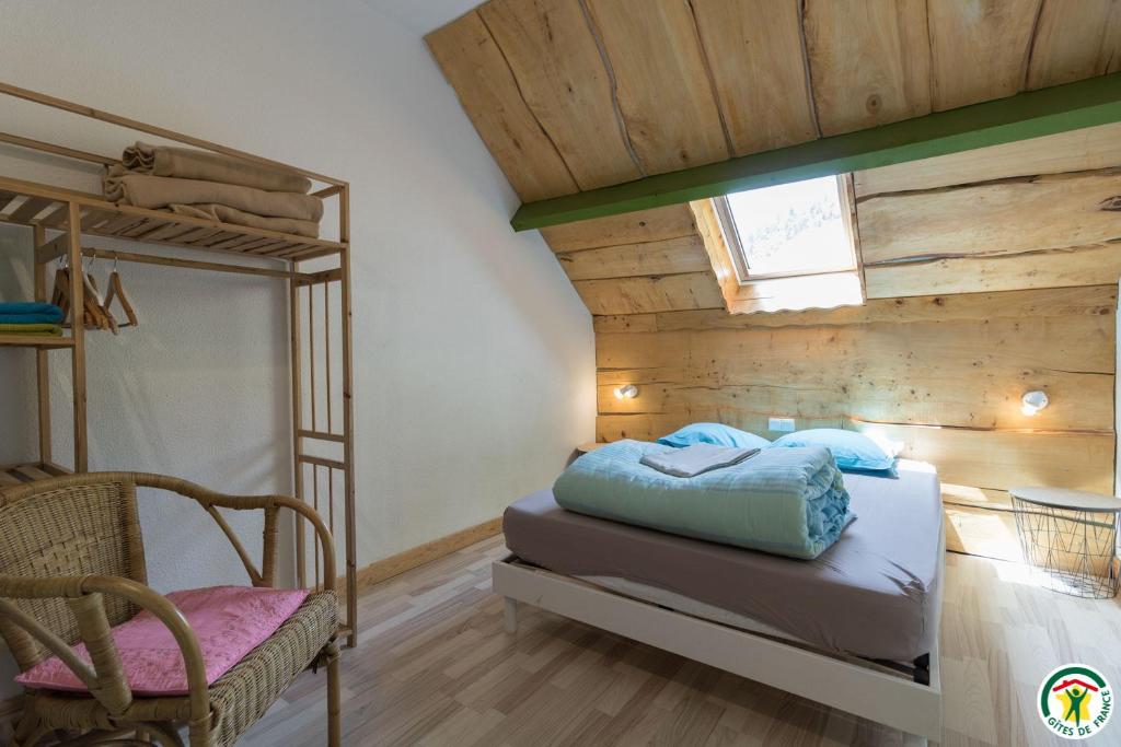 Postel nebo postele na pokoji v ubytování Auberge La Soulan