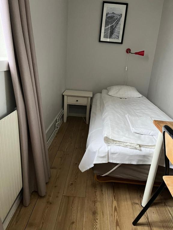 Postel nebo postele na pokoji v ubytování Halmstad Hotell & Vandrarhem Kaptenshamn