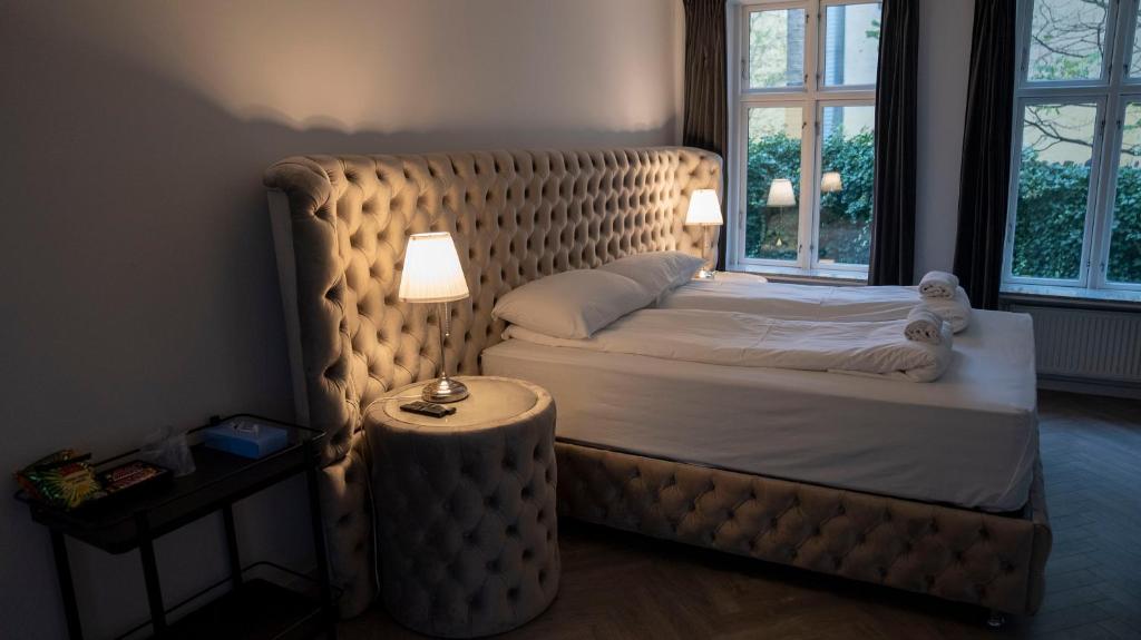 Postel nebo postele na pokoji v ubytování A Hotels City