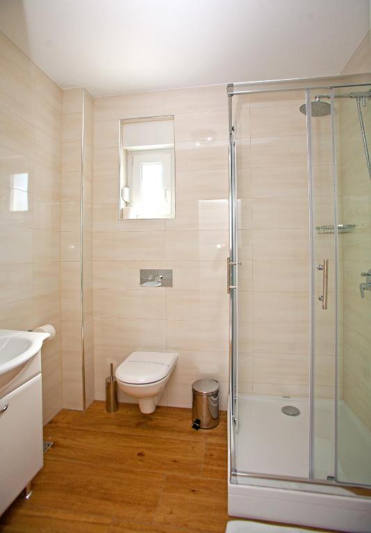 Kúpeľňa v ubytovaní Apartments Maslina I