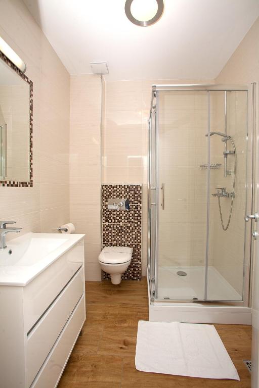 Kúpeľňa v ubytovaní Apartments Maslina I