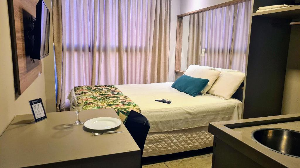 Una televisión o centro de entretenimiento en Uno Flats - By EasyHost