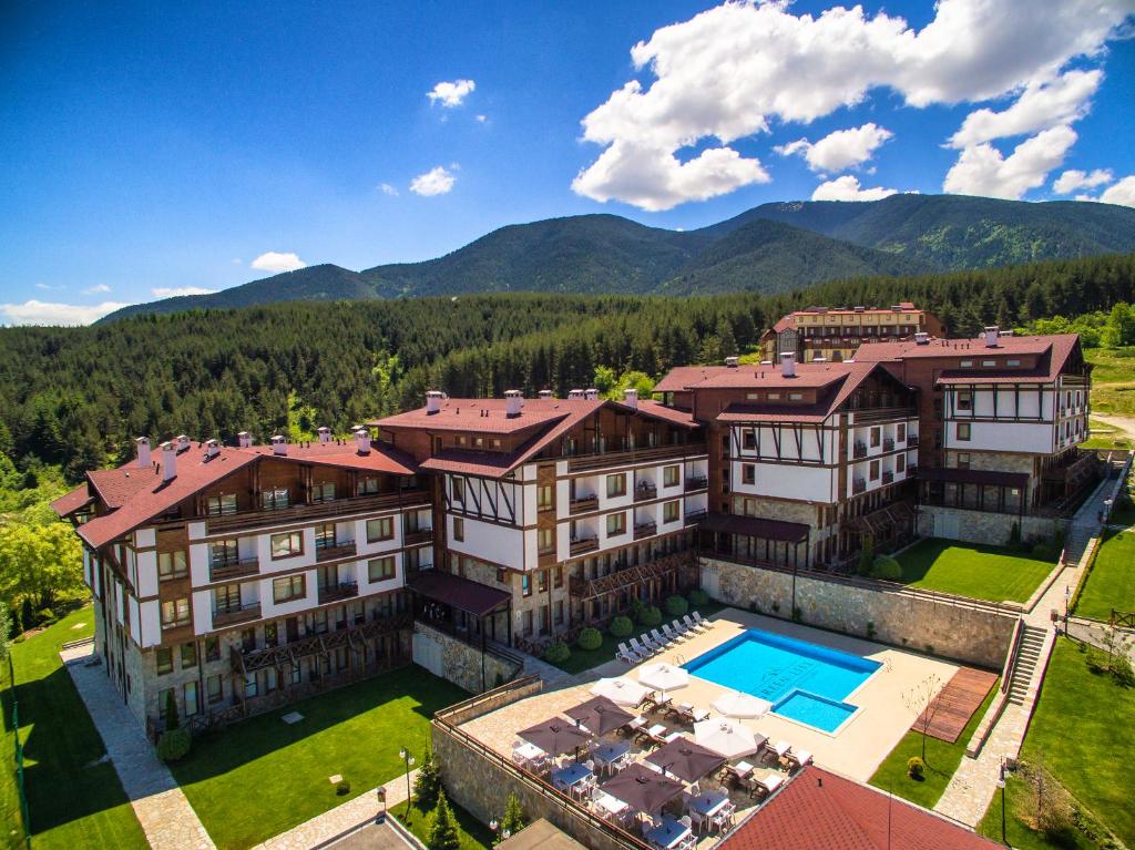 an aerial view of a mansion with a swimming pool at Green Life Bansko in Bansko