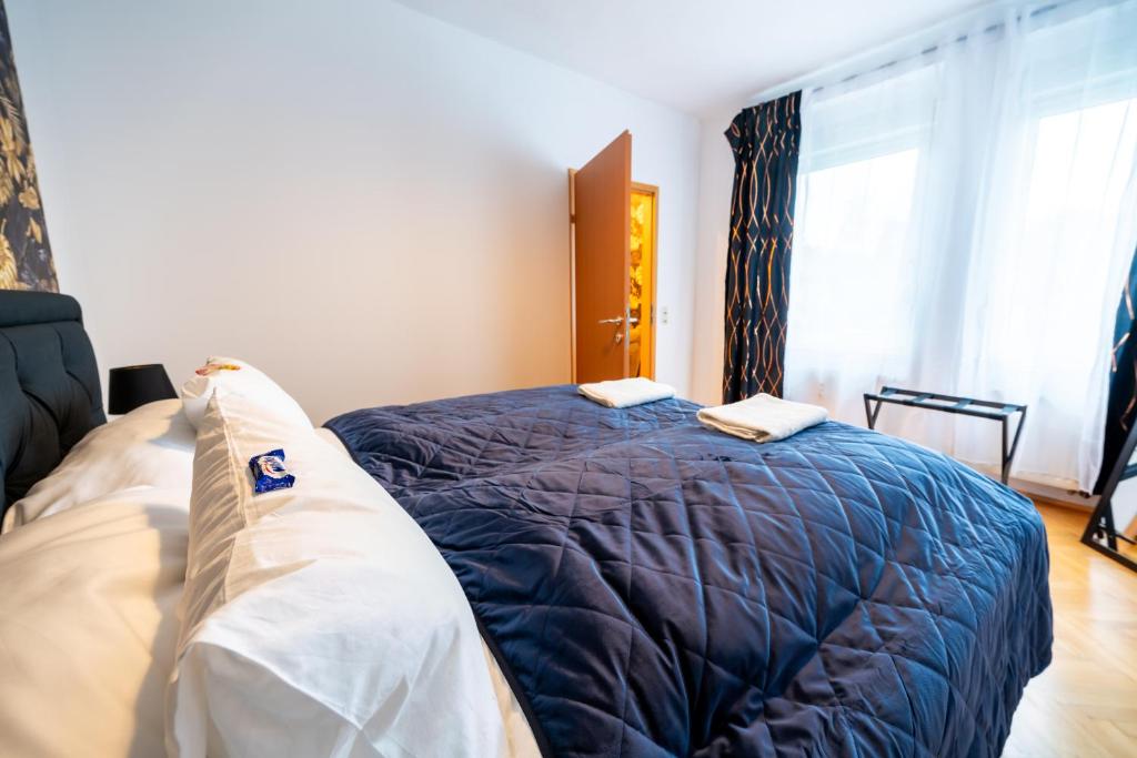 Uma cama ou camas num quarto em Modernes Appartement