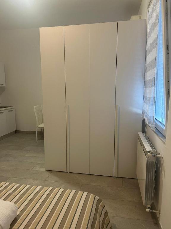 Postel nebo postele na pokoji v ubytování Caprotti 6