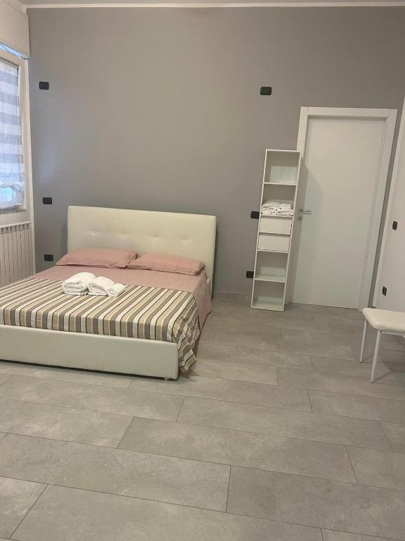 Postel nebo postele na pokoji v ubytování Caprotti 6