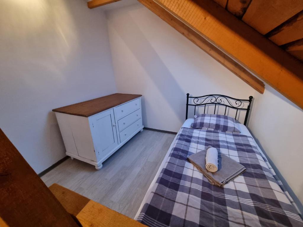 Postel nebo postele na pokoji v ubytování Čenovický dvůr