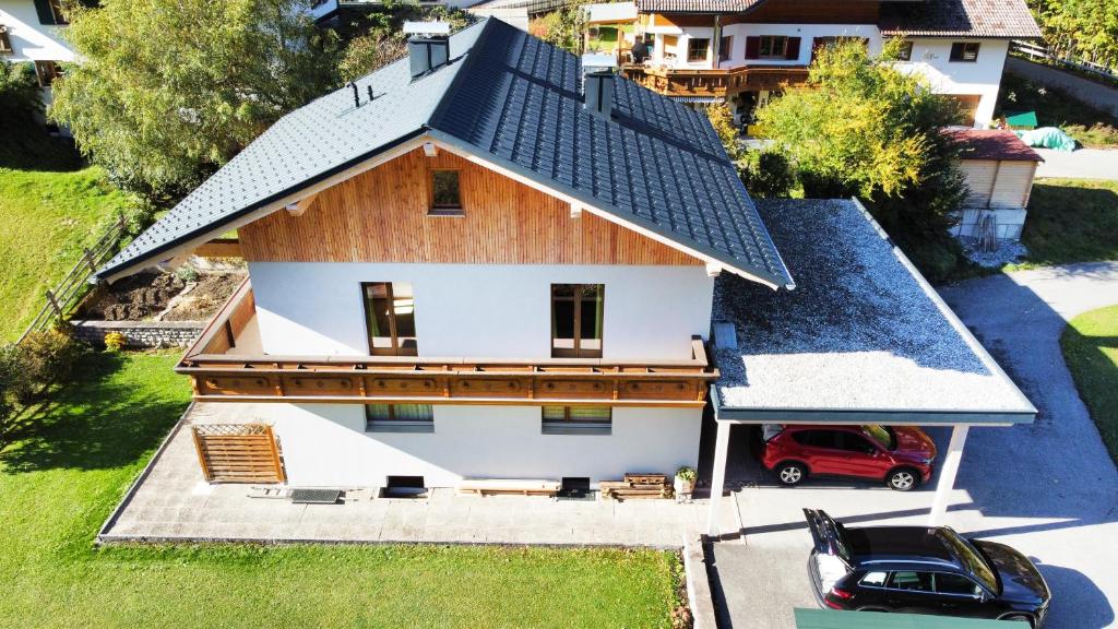 an overhead view of a house with a roof at Pension Sonnegg in Gallaverda