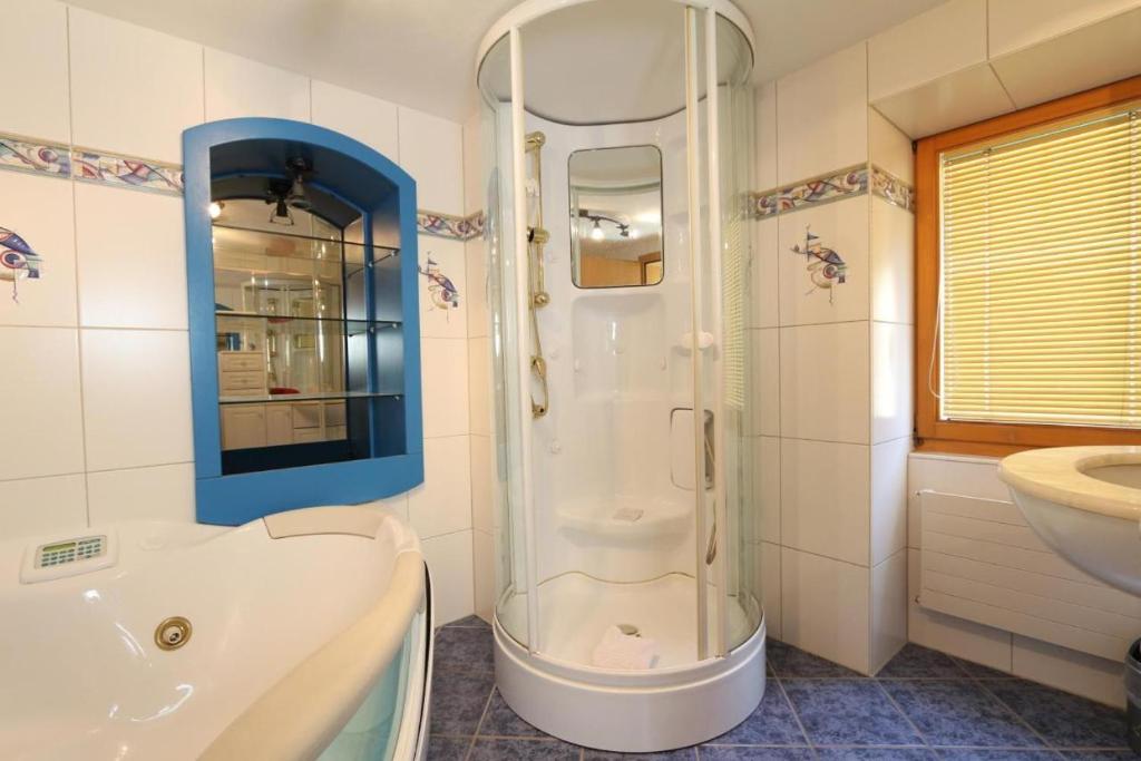 Koupelna v ubytování Hotel Alpina