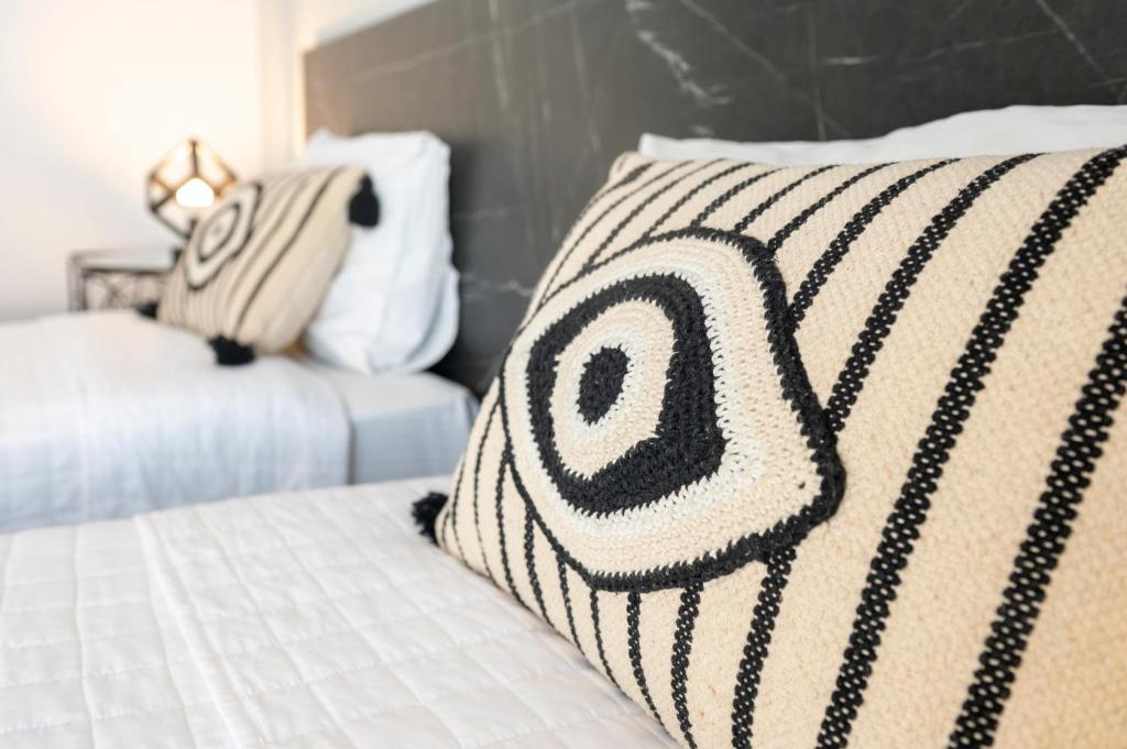 Postel nebo postele na pokoji v ubytování Hotel Papanikolaou