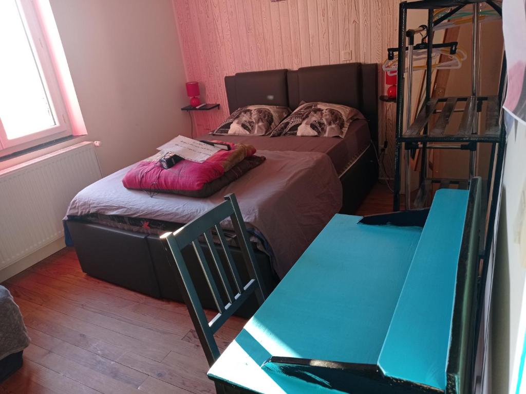 Postel nebo postele na pokoji v ubytování studio type 1bis