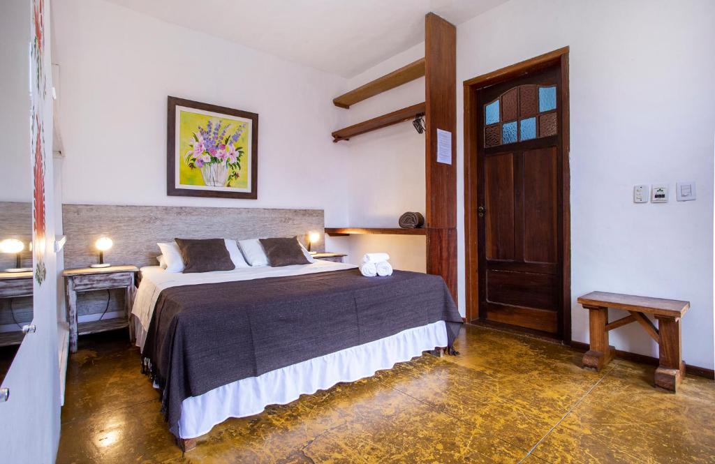 Postel nebo postele na pokoji v ubytování Pousada Recanto da Villa