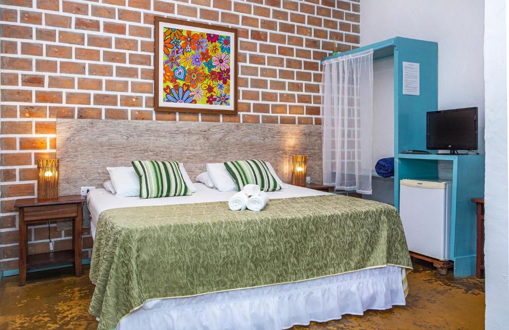 Postel nebo postele na pokoji v ubytování Pousada Recanto da Villa