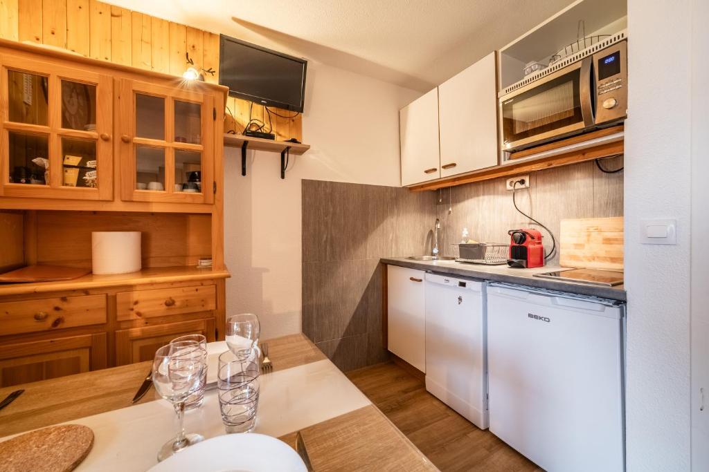 Kuchyň nebo kuchyňský kout v ubytování Appartement Morillon 4pers