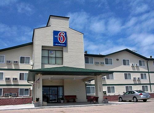 a hotel with a car parked in front of it at Americas Best Value Inn Jefferson City in Jefferson City