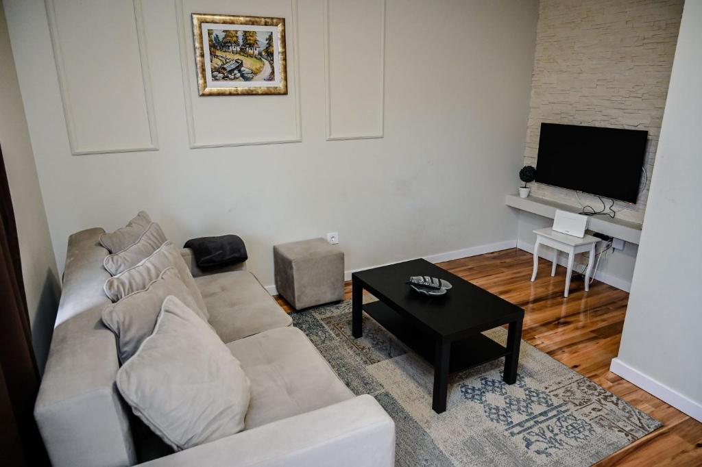 TV a/nebo společenská místnost v ubytování Onix Residence