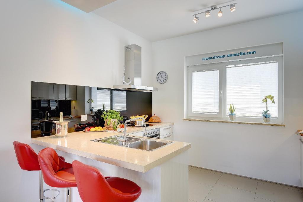 Cuisine ou kitchenette dans l'établissement Villa Sky Dream